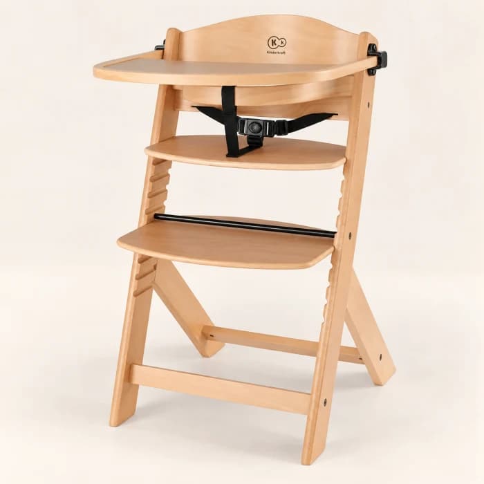A wooden adjustable high chair on a light background.